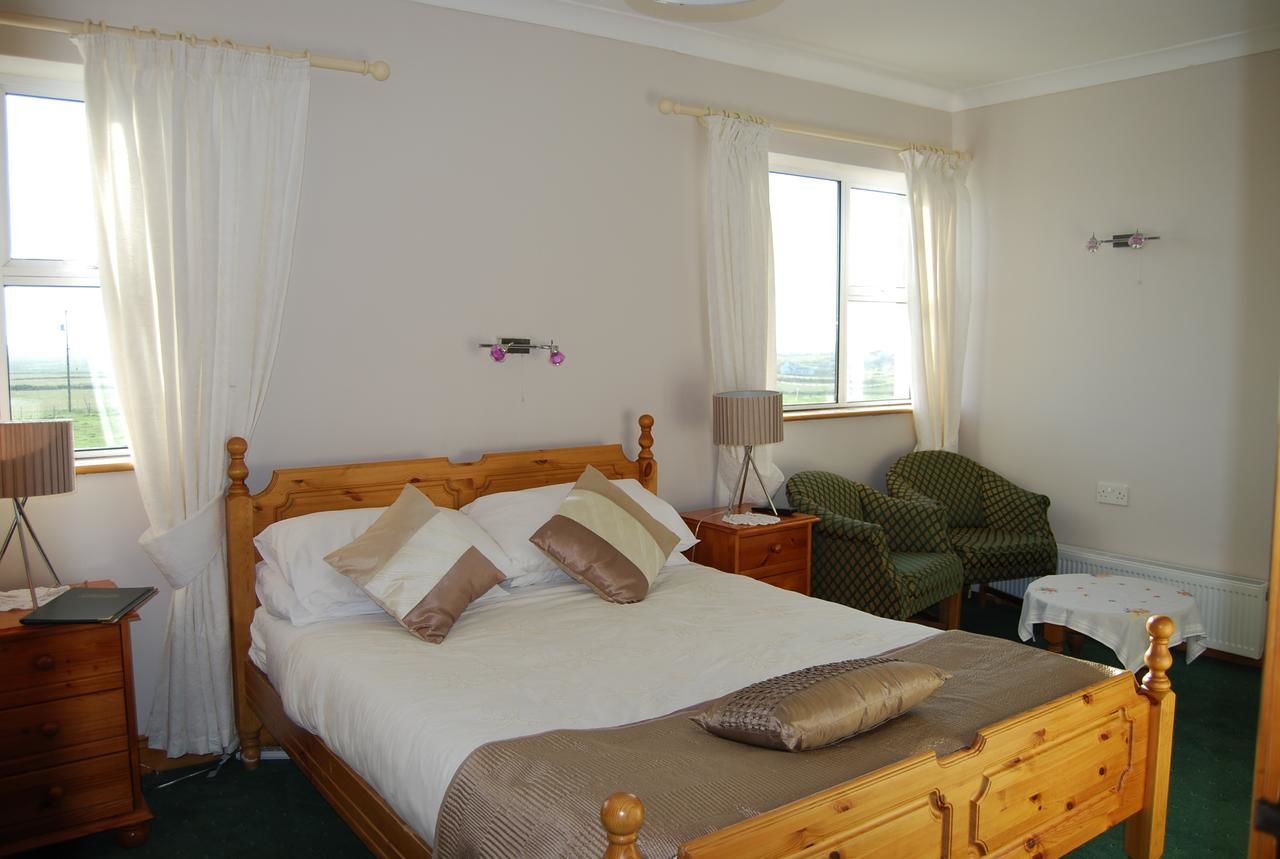 Отели типа «постель и завтрак» Clonmore Lodge B&B Quilty